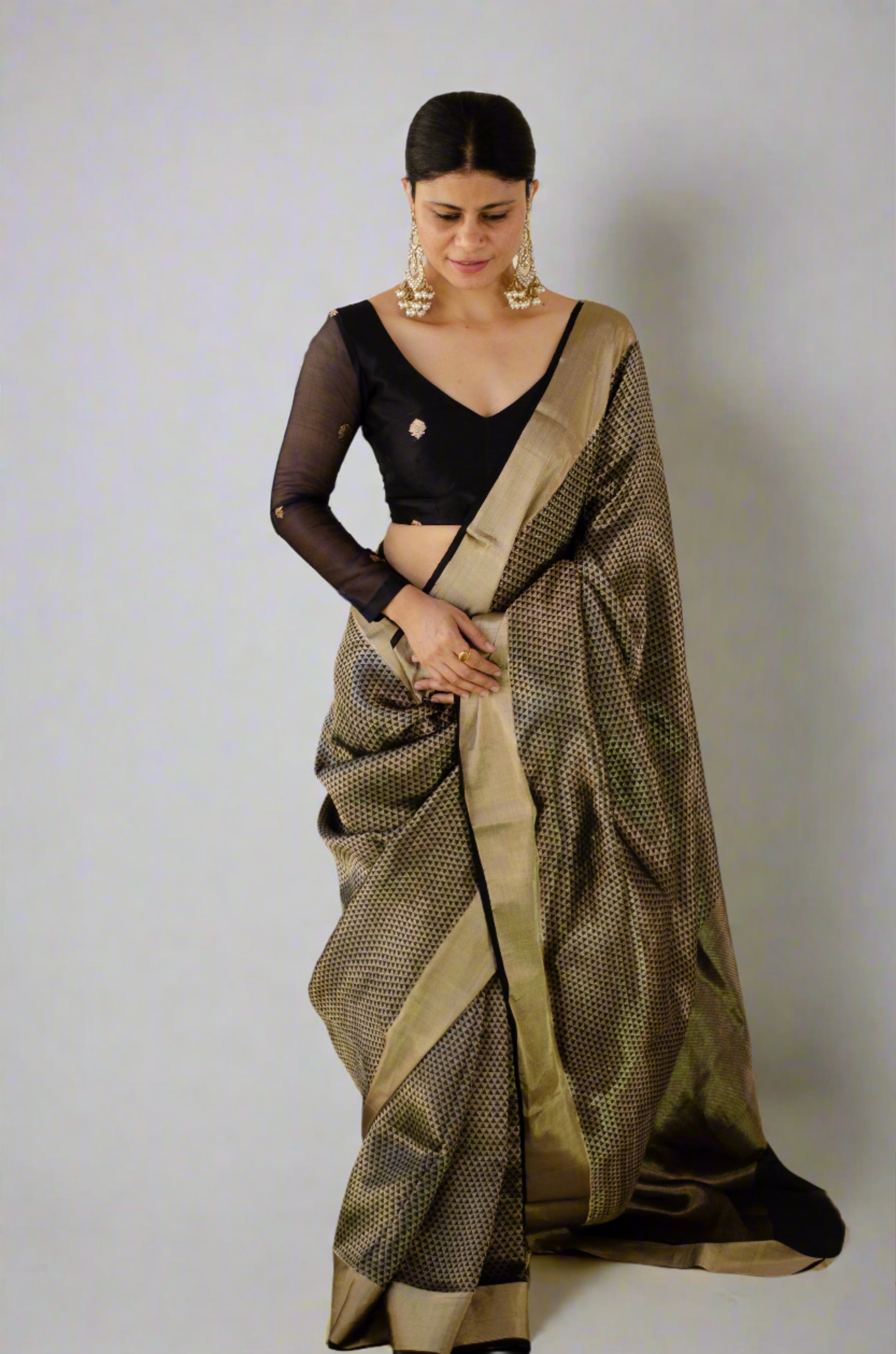 Nalli - This 'Ishani' Chanderi silk cotton saree is ornated with 'ek-naal'  Brahmakamal zari motifs, blouse fabric available exclusively at Nalli Dress  Materials. Shop Now at https://www.nalli.com/black-chanderi-silk-cotton- saree-es0095594 Presenting ...